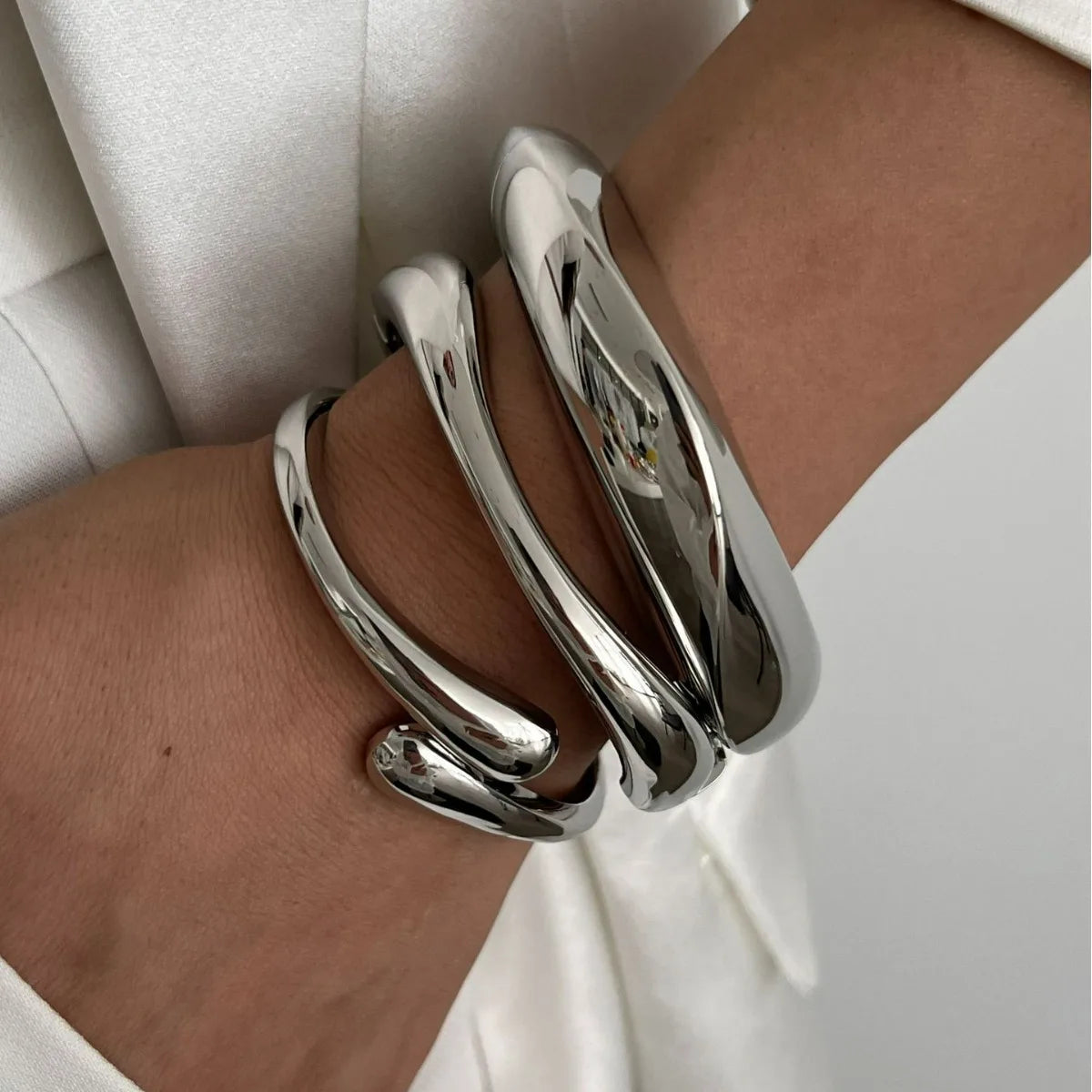 Geometrischer Armreif in Gold & Silber