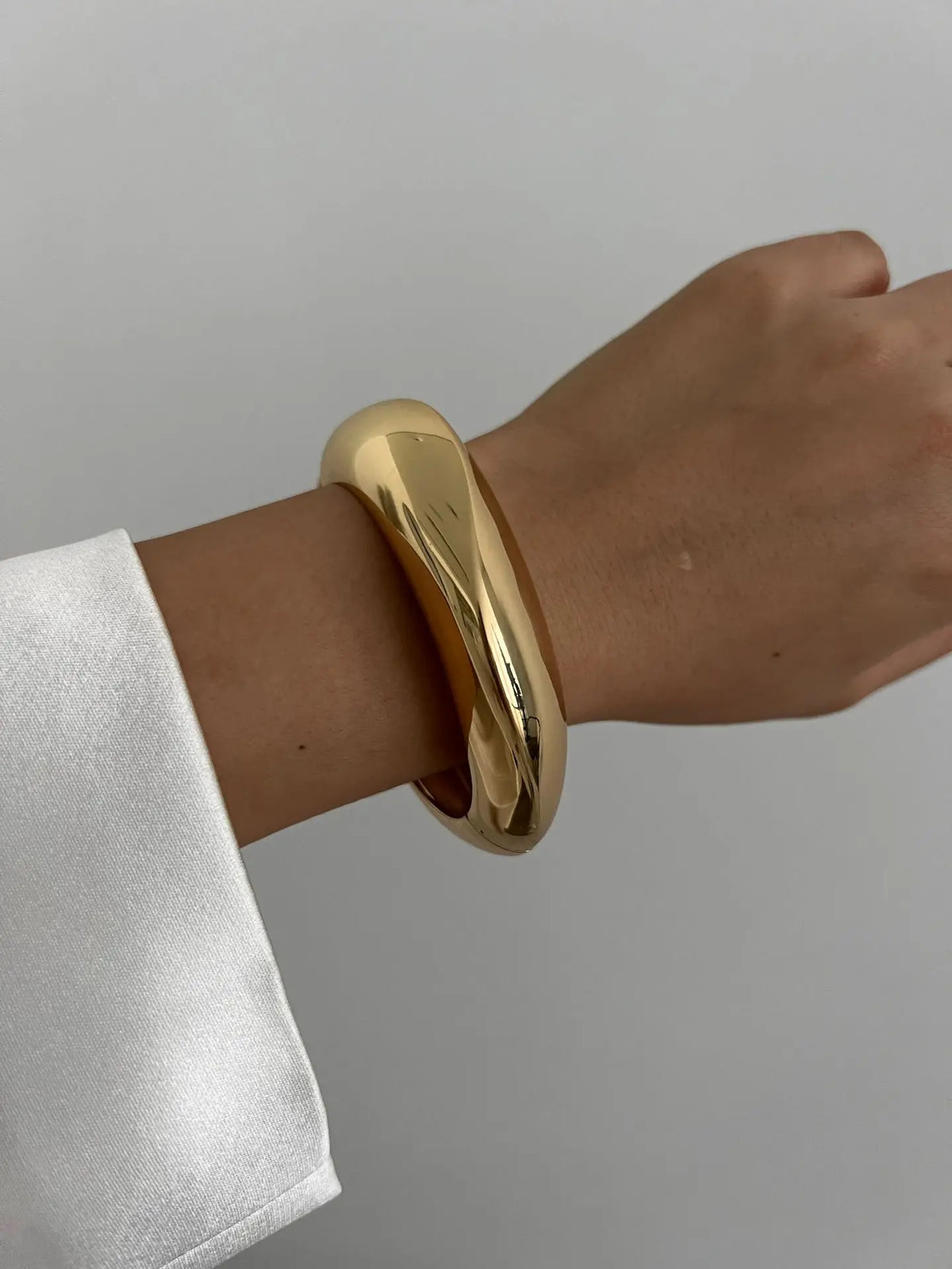 Geometrischer Armreif in Gold & Silber