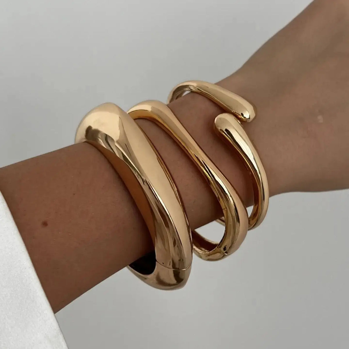 Geometrischer Armreif in Gold & Silber