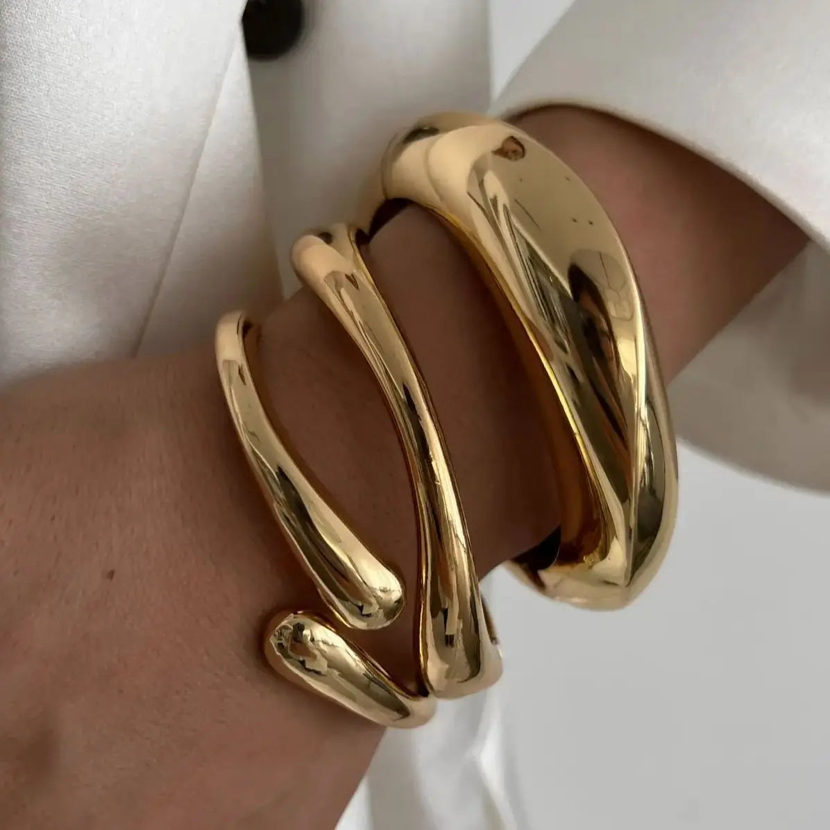 Geometrischer Armreif in Gold & Silber