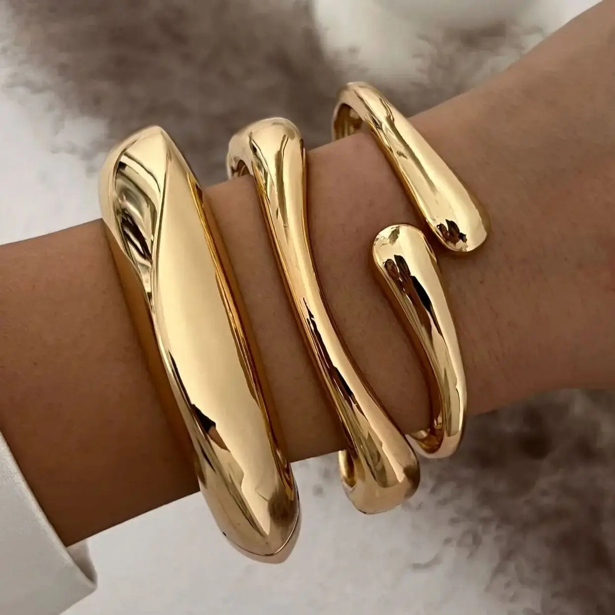 Geometrischer Armreif in Gold & Silber