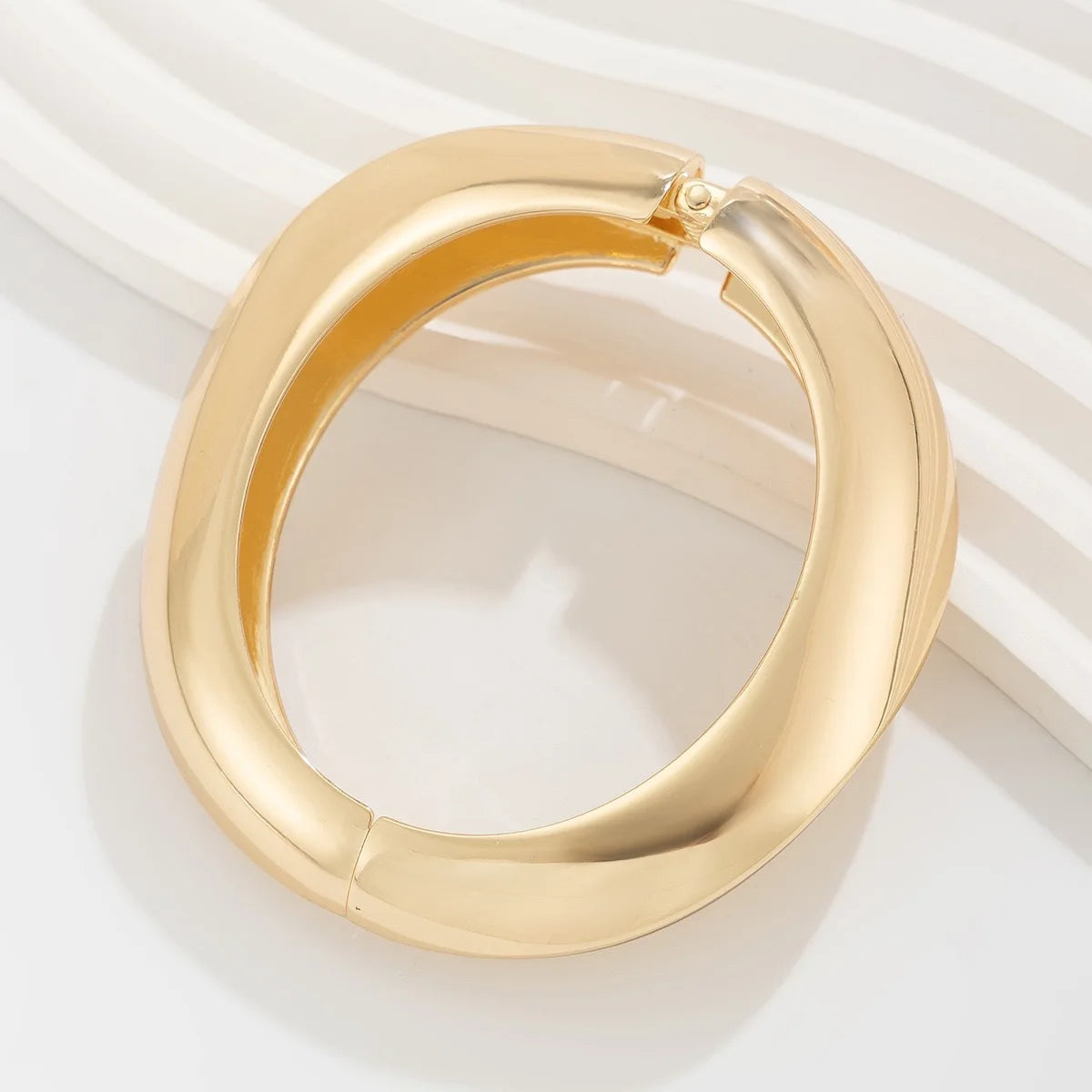 Geometrischer Armreif in Gold & Silber