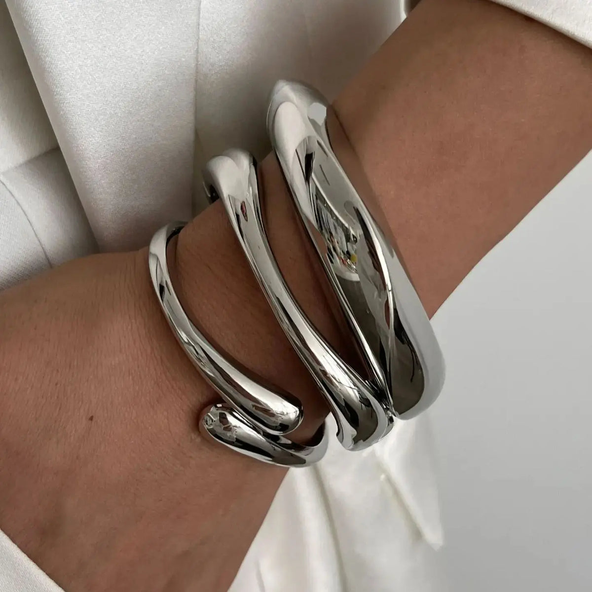 Geometrischer Armreif in Gold & Silber